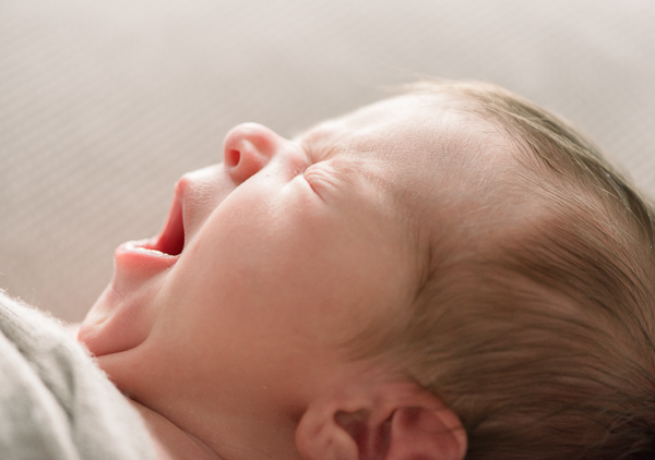 newborn baby yawning